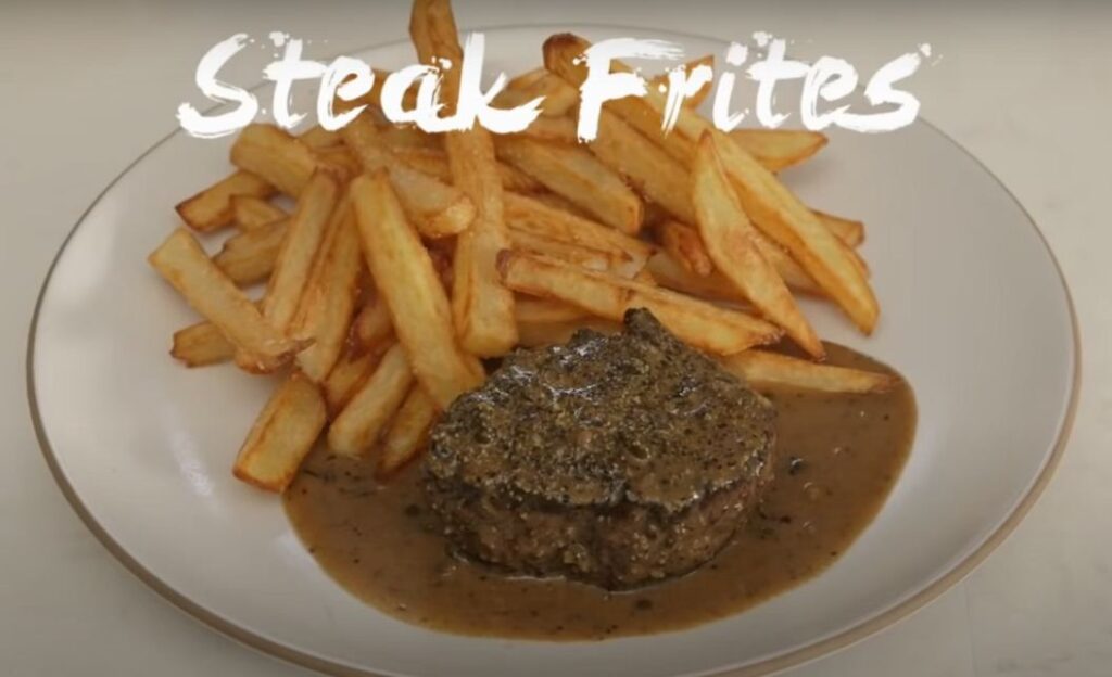 Tofu minute steak with black pepper sauce and Pommes Frites